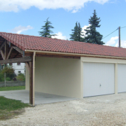Garage préfabriqué béton 2 pentes et 2 portes avec auvent