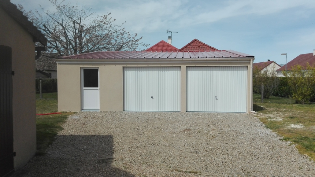 Garage double avec bac en acier et toit 1 pente.