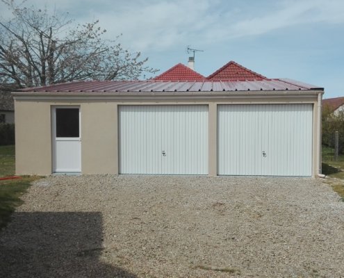 Garage double avec bac en acier et toit 1 pente.