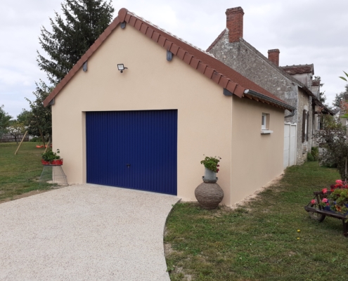 Garage préfabriqué porte bleu